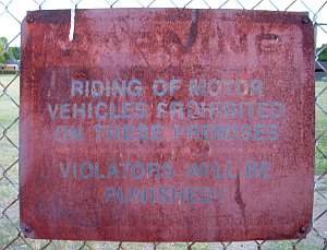 rusted sign
