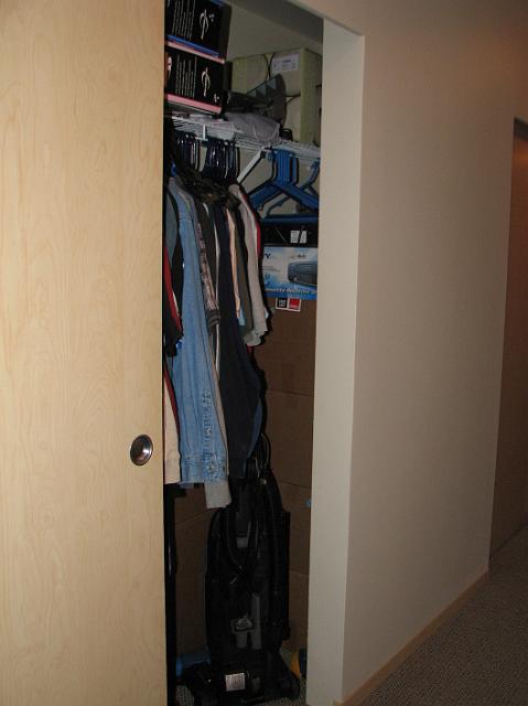 IMG_4779 Troy's closet crammed full of boxes and other junk.