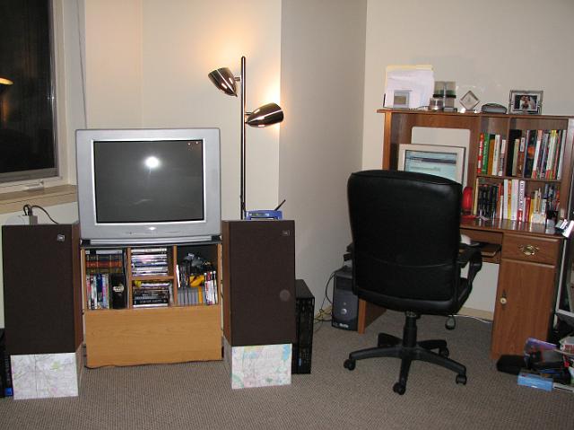 IMG_4789 The tv, speakers, and computer desk.  We hope to replace this crappy desk sometime soon.