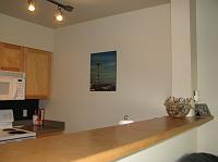 IMG_2116 Seattle poster mounted on wood in kitchen